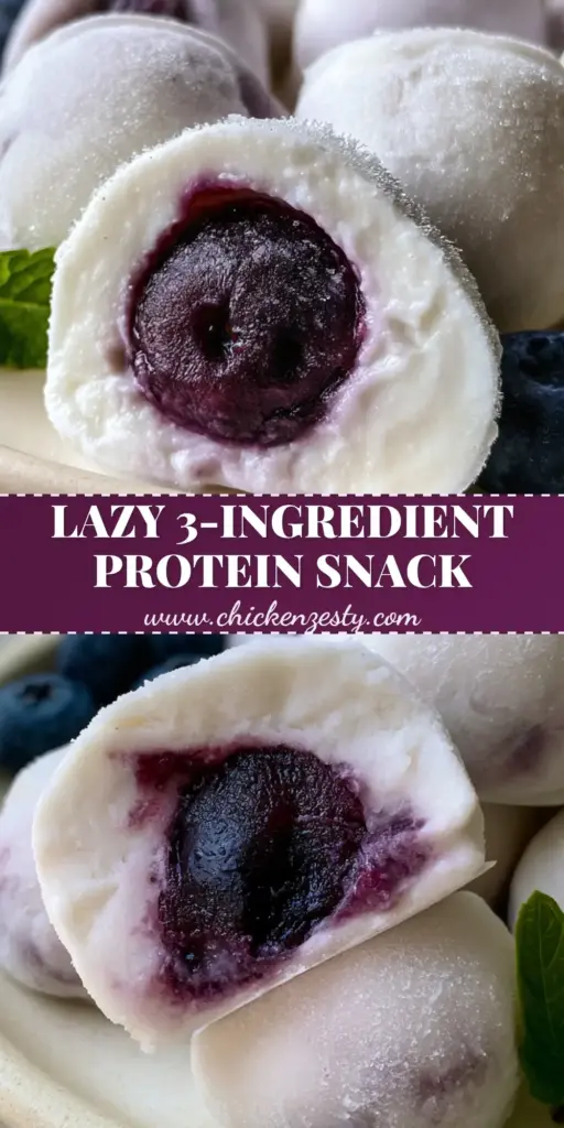 A cluster of frozen Blueberry Greek Yogurt Bites on a matte cream ceramic plate, featuring a honey swirl and fresh mint garnish.